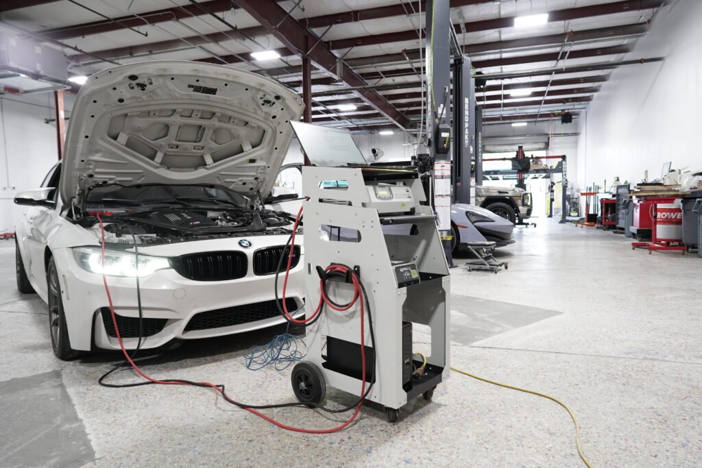 BMW connected to a factory diagnostic station at Eurocraft Automotive
